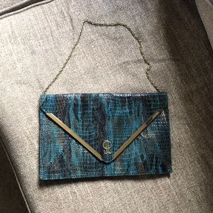 JLO hand bag- teal snake skin